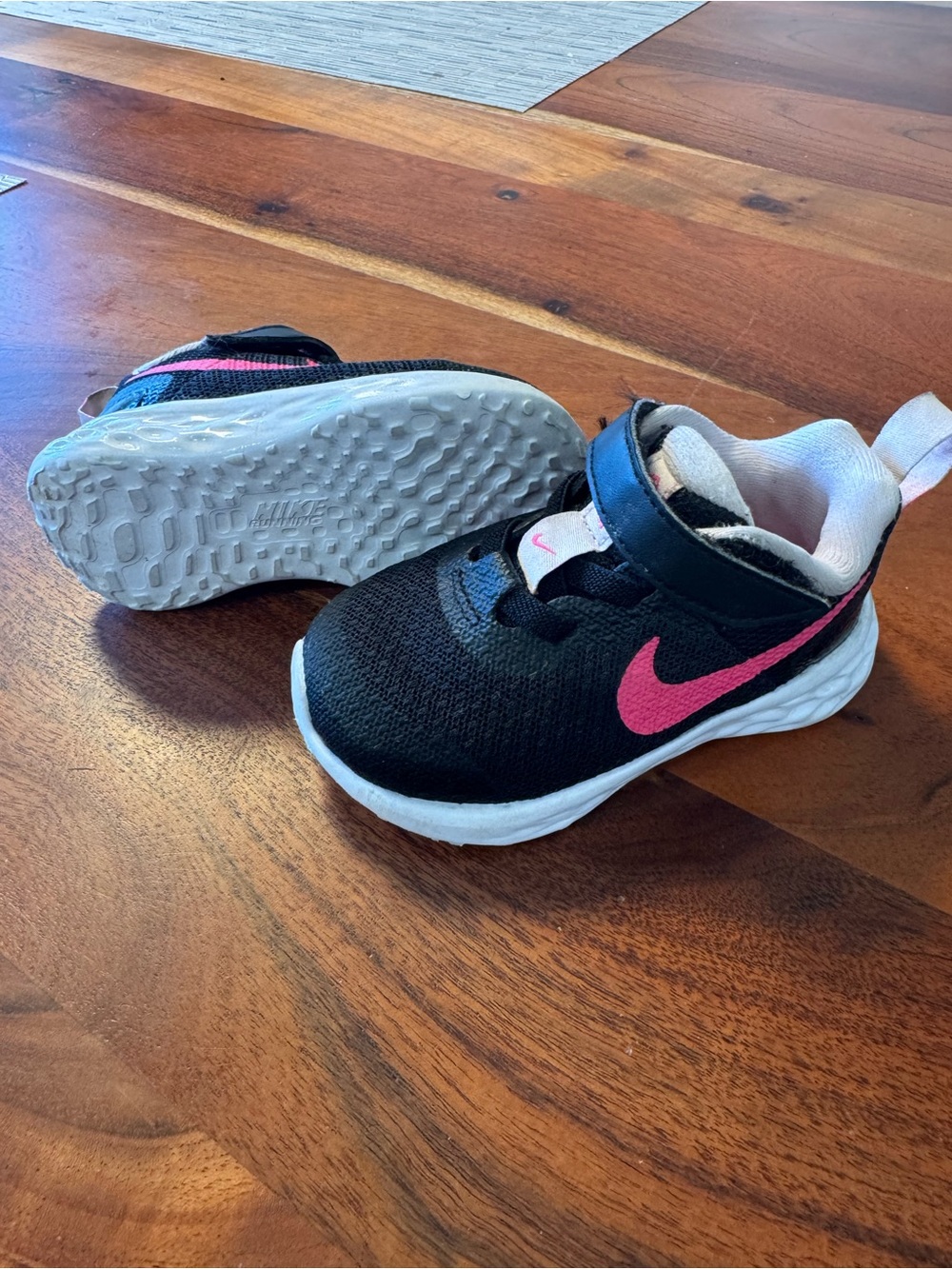 Nike Kids Black Sneakers with Pink Swoosh
